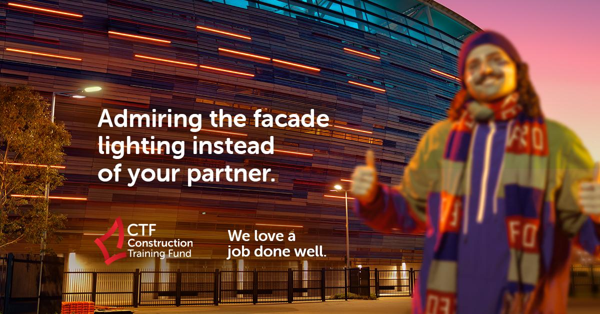 Bilboard with 3 people in purple in the background, with "The best things in life are freo" text in foreground"